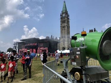A snow maker on Parliament Hill helped to cool down crowds on Canada Day
Ashley Fraser, Postmedia