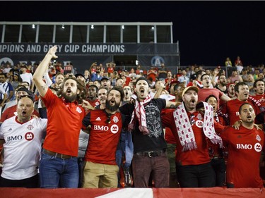 Toronto FC supporters cheer after their team defeated the Ottawa Fury FC during Canadian Championship soccer action in Toronto, Wednesday July 25, 2018.