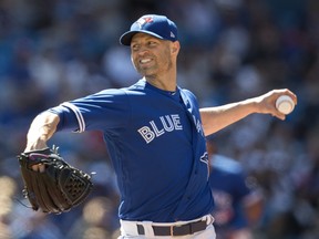 Toronto Blue Jays starting pitcher J.A. Happ works against the New York Yankees during the first inning on July 7, 2018.