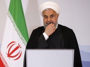 Hassan Rouhani, Iran's president, pauses during a news conference in Bern, Switzerland, on Tuesday, July 3, 2018.