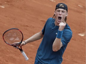 Canada's Denis Shapovalov celebrates winning against John Millman of Australia during a first-round match of the French Open in Paris on May 29.