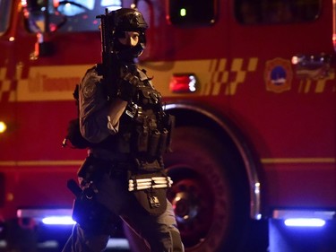 A tactical officer is seen at the scene of a mass casualty incident in Toronto on Sunday, July 22, 2018.