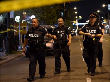 Police secure the scene of a mass casualty incident in Toronto on Sunday, July 22, 2018.