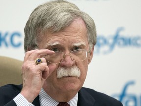 In this June 27, 2018, file photo, U.S. national security adviser John Bolton listens to question as speaks to the media after his talks with Russian President Vladimir Putin in Moscow, Russia.