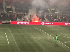 A small fire is seen at TD Place stadium during a game between the Ottawa Fury FC and Toronto FC on Wednesday, July 18, 2018.