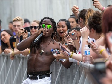 The performer BLACK IRI$H joins with fans at the Black Sheep Stage of RBC Ottawa Bluesfest on Friday evening. Wayne Cuddington/Postmedia