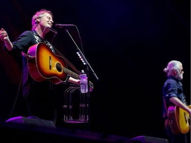 Jim Cuddy (L) and Greg Keelor (R) of Blue Rodeo on the City Stage as the RBC Bluesfest continues on the grounds of the Canadian War Museum at Lebreton Flats.