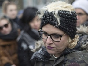 Mandi Gray stands with supporters as she talks with media outside court in Toronto on Tuesday, March 14, 2017, as Mustafa Ururyar appeals his conviction and sentence on the sexual assault of Ms. Gray.