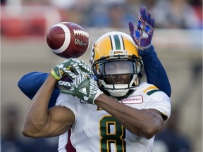 Alouettes defensive back Mitchell White stops Edmonton Eskimos wide receiver Kenny Stafford from completing the pass at Molson Stadium in Montreal on Thursday, July 26, 2018.