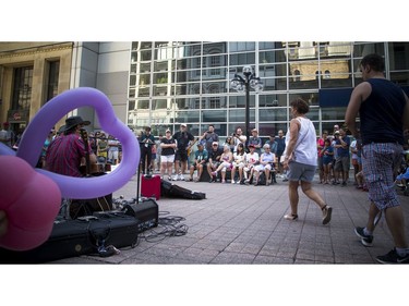 George Kamikawa entertained a Buskerfest crowd at the Art Department Stage.