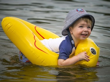 Two-year-old Grayson Roberts — and his rubber ducky floaty —seemed to be enjoying a dip in the Rideau River at Mooney's Bay on Saturday.
