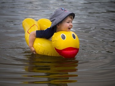 Two-year-old Grayson Roberts — and his rubber ducky floaty —seemed to be enjoying a dip in the Rideau River at Mooney's Bay on Saturday.