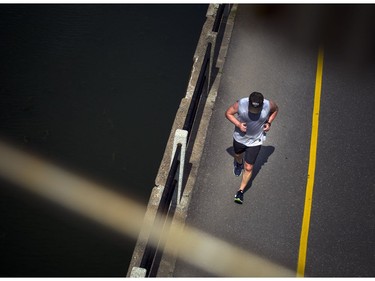 A runner braved the heat and got a jog in along the canal Saturday.