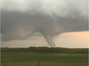 This picture taken by Bryan Mozdzen shows a tornado that touched down near Alonsa, Man., on Friday.