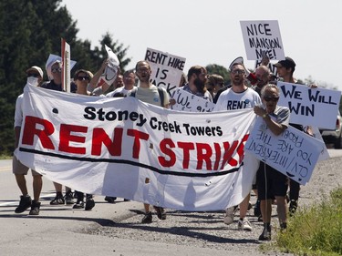 Members of the Hamilton Tenants Solidarity Network and the Herongate Tenant Coalition protest near the home of CLV Group CEO Mike McGahan in Manotick on Saturday, Aug. 11, 2018.