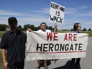 Members of the Hamilton Tenants Solidarity Network and the Herongate Tenant Coalition protest near the home of CLV Group CEO Mike McGahan in Manotick on Saturday, Aug. 11, 2018.