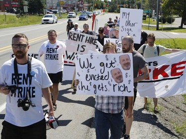 Members of the Hamilton Tenants Solidarity Network and the Herongate Tenant Coalition protest near the home of CLV Group CEO Mike McGahan in Manotick on Saturday, Aug. 11, 2018.