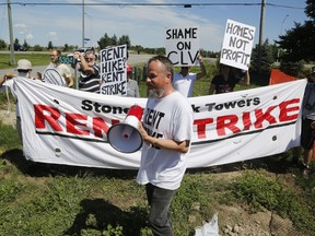 Members of the Hamilton Tenants Solidarity Network and the Herongate Tenant Coalition protest near the home of CLV Group CEO Mike McGahan in Manotick on Saturday, Aug. 11, 2018.