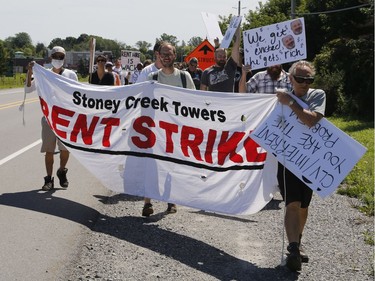 Members of the Hamilton Tenants Solidarity Network and the Herongate Tenant Coalition protest near the home of CLV Group CEO Mike McGahan in Manotick on Saturday, Aug. 11, 2018.