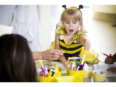The Canada Agriculture and Food Museum held a day of activities for the whole family to celebrate World Honeybee Day Saturday August 18, 2018. Three-year-old Olivia Poirier was enjoying colouring some bee drawings Saturday.