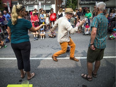 The FUSE Street Festival took over Westboro Saturday August 18, 2018 with music, buskers, shops and patios to stop and enjoy a meal at, to name a few. The festival is in support of Cornerstone Housing for Women and Westboro Region Food Bank shut down Richmond Road. Busker Chris Pilsworth entertained the crowd.