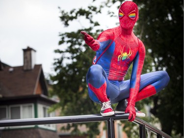 The Capital Pride Parade filled the streets with over 130 groups including community groups, sports teams, embassies and local businesses  along with thousands of spectators Sunday August 26, 2018. Priderman who is also known as Brett Kelly was in full character before the parade kicked off Sunday.  Ashley Fraser/Postmedia