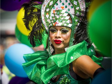 Drag Queen Kiki Coe was looking glamorous in her green during the Capital Pride Parade on Sunday.   Ashley Fraser/Postmedia