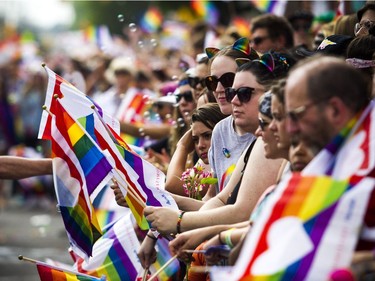 The Capital Pride Parade filled the streets with more than 130 groups including community groups, sports teams, embassies and local businesses along with thousands of spectators.   Ashley Fraser/Postmedia