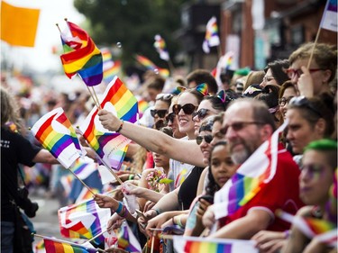 The Capital Pride Parade filled the streets with over 130 groups including community groups, sports teams, embassies and local businesses  along with thousands of spectators Sunday August 26, 2018.   Ashley Fraser/Postmedia