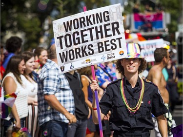 The Capital Pride Parade filled the streets with over 130 groups including community groups, sports teams, embassies and local businesses  along with thousands of spectators Sunday August 26, 2018.   Ashley Fraser/Postmedia