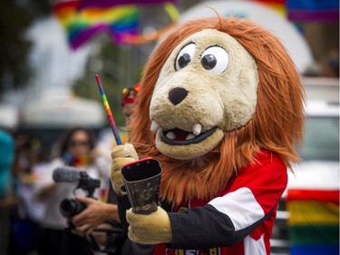 The Capital Pride Parade filled the streets with over 130 groups including community groups, sports teams, embassies and local businesses  along with thousands of spectators Sunday August 26, 2018. Spartacat was making lots of noise with his rainbow coloured noise maker.   Ashley Fraser/Postmedia