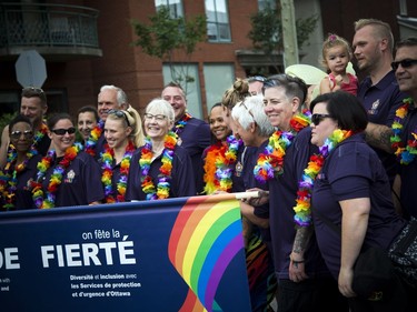 The Capital Pride Parade filled the streets with over 130 groups including community groups, sports teams, embassies and local businesses  along with thousands of spectators Sunday August 26, 2018. A group of Ottawa Police Service members took part in the march Sunday.   Ashley Fraser/Postmedia