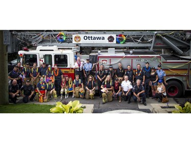 A group of Ottawa Fire Service members took part in the Capital Pride Parade on Sunday.   Ashley Fraser/Postmedia
