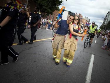 The Capital Pride Parade filled the streets with over 130 groups including community groups, sports teams, embassies and local businesses  along with thousands of spectators Sunday August 26, 2018.   Ashley Fraser/Postmedia