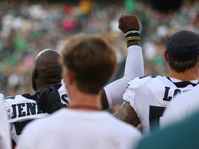 Malcolm Jenkins of the Philadelphia Eagles raises his fist during the national anthem before Thursday's NFL pre-season game against the Pittsburgh Steelers.