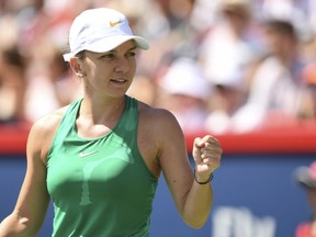 Simona Halep of Romania acknowledges the crowd after completing a 6-4, 6-1 victory against Ashleigh Barty in a Rogers Cup singles semifinal at Montreal on Saturday.