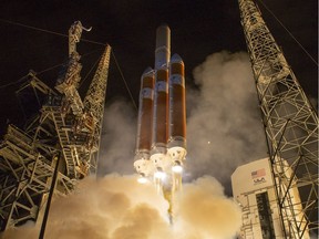 In this handout provided by NASA, The United Launch Alliance Delta IV Heavy rocket launches NASA's Parker Solar Probe to touch the Sun from Launch Complex 37 at Cape Canaveral Air Force Station on August 12, 2018 in Cape Canaveral, Florida. Parker Solar Probe is humanity's first-ever mission into a part of the Suns atmosphere called the corona. The probe will directly explore solar processes that are key to understanding and forecasting space weather events that can impact life on Earth.