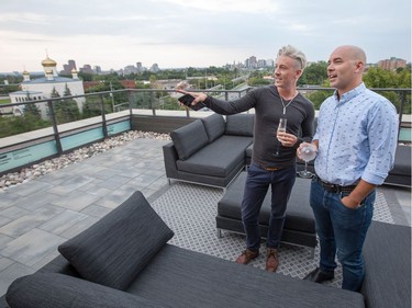 Andy McCarthy (L) and husband Paddy McCarthy take in the view as brokerage firm Engel & Völkers is taking the resale property showing game to the next level.