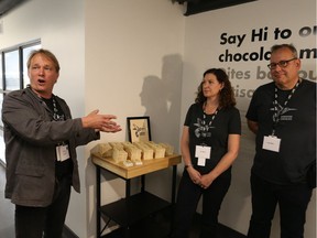 Bruce Linton, left, CEO of Canopy Growth, introduces Drew and Erica Gilmour of Hummingbird chocolate in the new Tweed visitor centre in Smiths Falls on Thursday, Aug. 23, 2018.