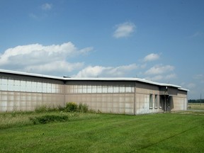 The National Capital Commission is proposing that this building and a portion of the former Greenbelt Research Farm (off Woodroffe Ave., across from the Nepean Sportsplex) be turned into a film sound stage for the Ottawa Film Office. Previously used by Agriculture Canada in the sixties, the farm was acquired by the NCC in 2000 following the closure of the facility there in 1998.  The project proposes to use an already developed building and portion of the research farm - 9.86 hectares of the 822.8-hectare property - for a stage campus and creative hub.