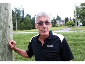 Marcel Lamoureux came to the aide of two men attacked by a dog.