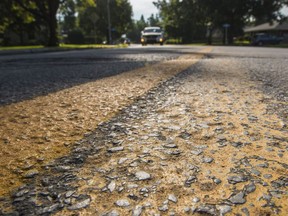 A centre of road line repainted along Sherbourne Road in Ottawa on August 9, 2018.