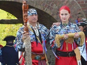 Town crier Daniel Richer with his stolen talking stick, with Julia Dudley.