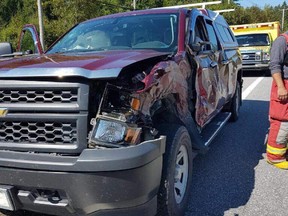 One-tonne scoop fell off transport and clipped a truck near Edelweiss.