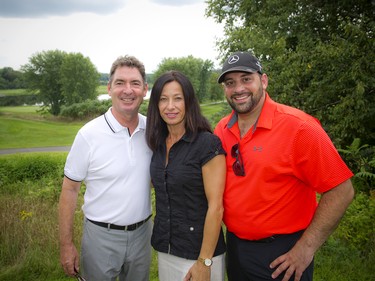 From left, Dan Fisher, program director with MercedesTrophy; Lina Caruso, executive assistant with Star Motors of Ottawa, and Adam Asiri, business development manager with Star Motors of Ottawa.