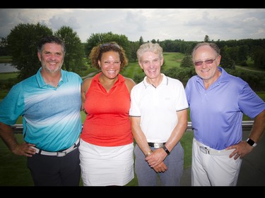 From left, Jim Hemlin, Lanny Hayes, Brad Fulton (the closest to the line winner) and Nathan Smith.