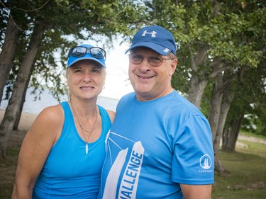 Tim Hanley and Susan Scott after completing Saturday's 13km stand up paddle board race.