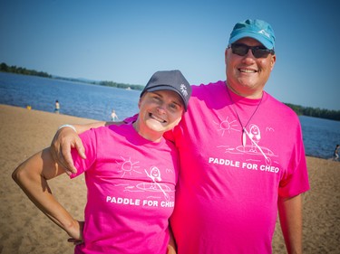 L.A. Schmidt, the first-place women's kayaker, and her husband Bevin Schmidt, the first-place finisher in the men's kayak division, in Saturday's 13km race.