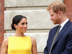 Britain's Prince Harry, Duke of Sussex and Britain's Meghan, Duchess of Sussex arrive to attend a reception marking the culmination of the Commonwealth Secretariats Youth Leadership Workshop, at Marlborough House in London on July 5, 2018.