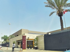 A man stands outside the Canadian Embassy in the Saudi capital Riyadh, on August 7, 2018, one day after Saudi Arabia said it was expelling the Canadian ambassador and recalling its envoy while freezing all new trade, in retaliation for Ottawa's vigorous calls for the release of jailed activists. Saudi Arabia and Canada showed no signs of backing down in an escalating row over human rights, after Riyadh abruptly cut ties over Ottawa's vigorous calls for the release of activists jailed in the kingdom.